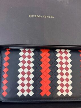 NIB Authentic Bottega Veneta Black Leather Wallet with Red/White 
OPEN TO OFFERS